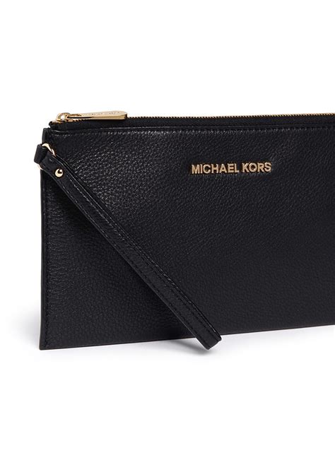 michael kors klatsch schwarz|michael kors black clutch.